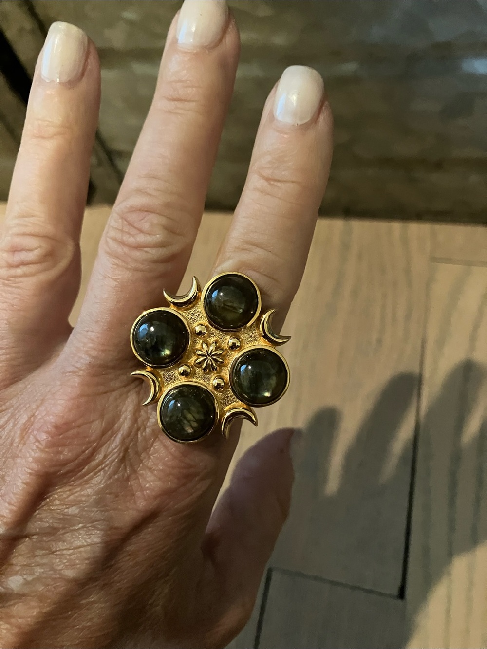 Gold-Tone Ring with Dark Green Cabochons